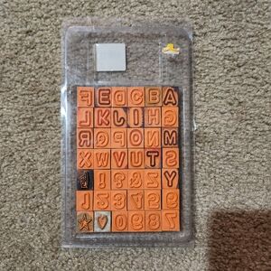 Alphabet Stamp Set Orange Rubber On Blue Foam